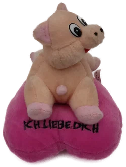 Schweinchen auf einem Herz 