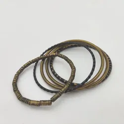 5 Armbänder schwarz, goldfarben S/M - Bild 2