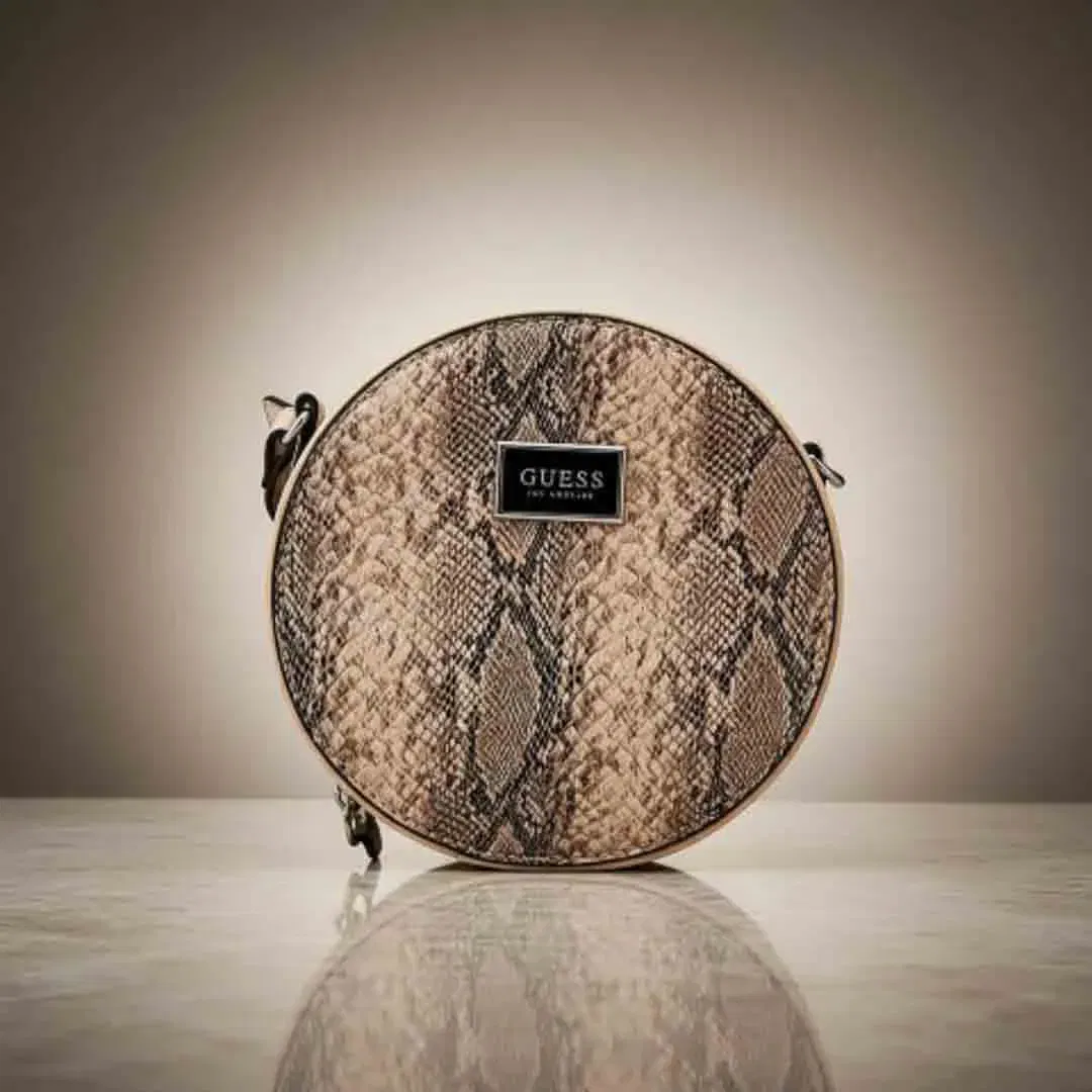 GUESS Los Angeles Runde Umhängetasche Snake Print Schlangenmuster Beige - Bild 1