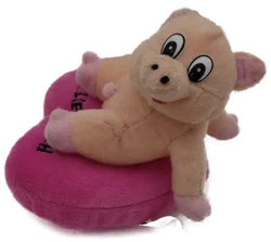 Schweinchen auf einem Herz 