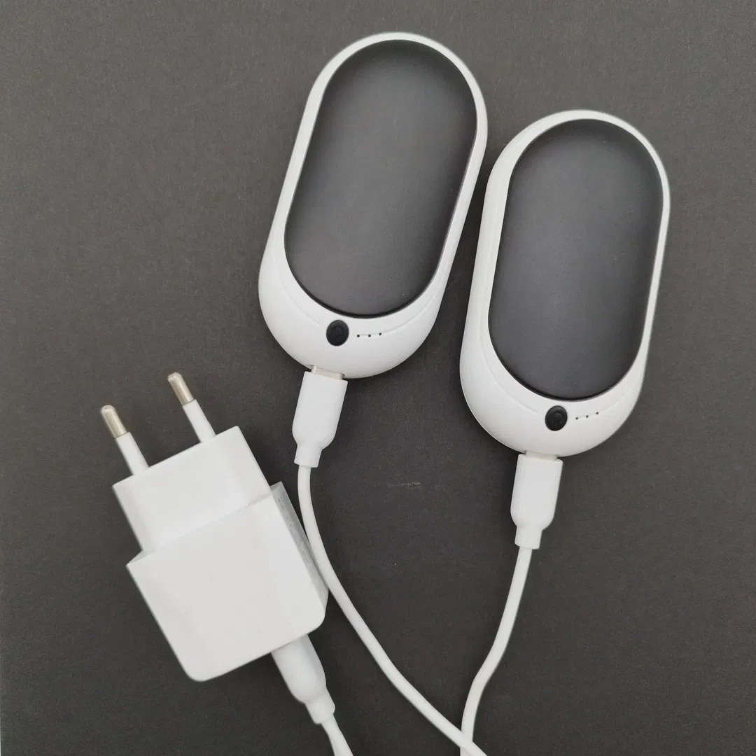 Elektrischer Handwärmer 2er Set, aufladbar, inkl. Ladekabel| Praktischer Begleiter - Bild 1